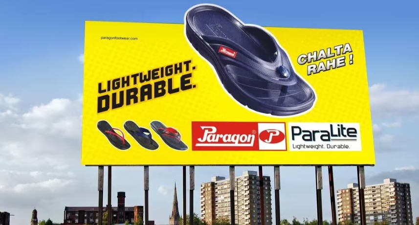 There is a hoarding printing on a board